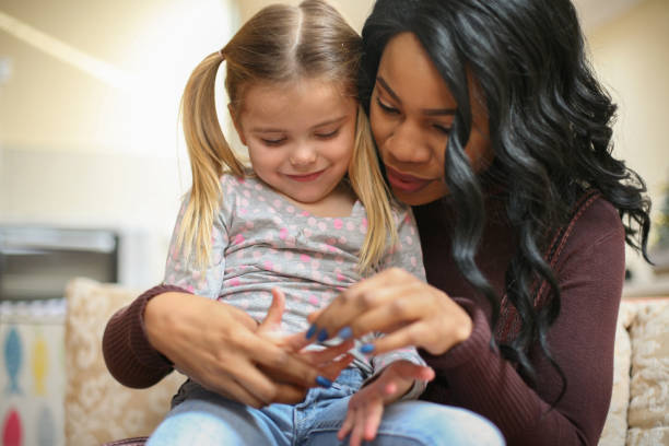 istock African American woman with child. 643879076