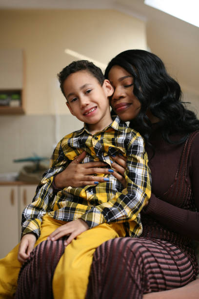 istock African American woman with her son. 643881556