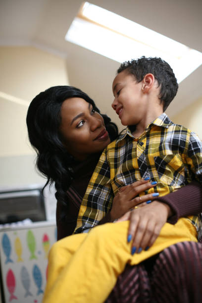 istock African American woman with her son. 643881672