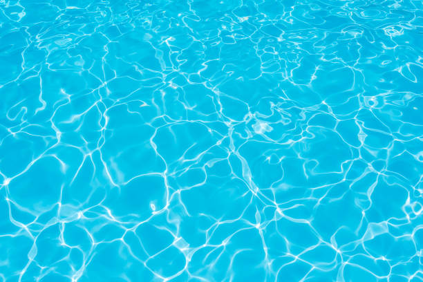 istock Beautiful ripple wave and blue water surface in swimming pool 643881916