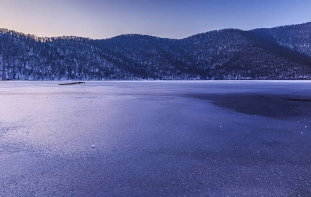 istock Frozen lake Nohur.Gabala.Azerbaijan 643882050