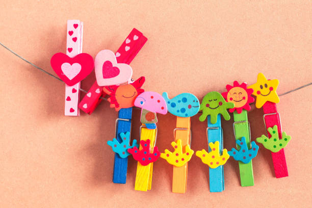 istock Heart-shaped of pin with colorful. 643882568