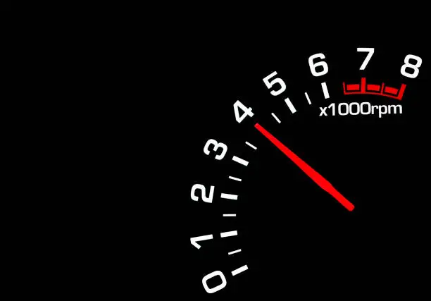 Photo of car speedometer tachometer on black background