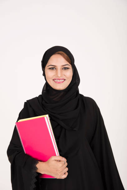 istock Young pretty arab muslim female student 643886744
