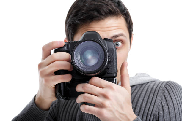 istock successful professional photographer use DSLR digital camera iso 643891118