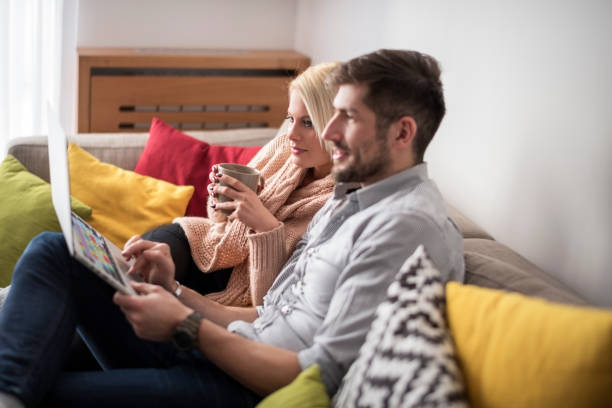 istock Couple in new apartment 643894356