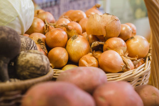 istock Vegetables on th supermarket grocery - onion, potato 643902330