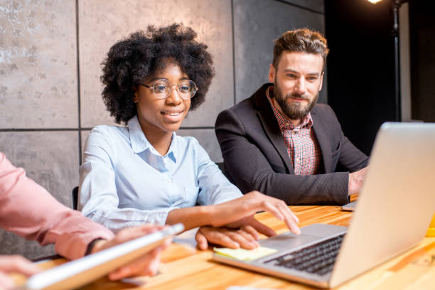 istock Coworkers working indoors 643905374