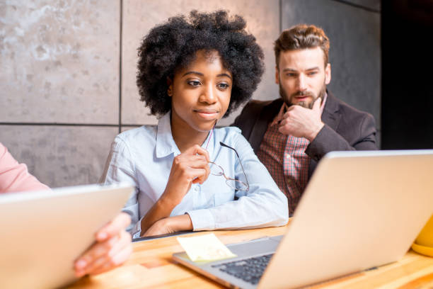 istock Coworkers working indoors 643905524