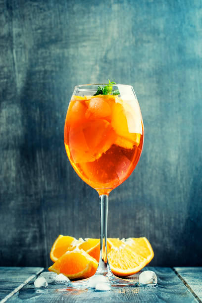 istock Summer cocktail aperitif with orange bitter, fruit, ice and soda 643905780