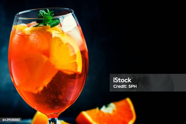 Summer Cocktail Aperitif With Orange Bitter Fruit Ice And Soda Stock Photo - Download Image Now