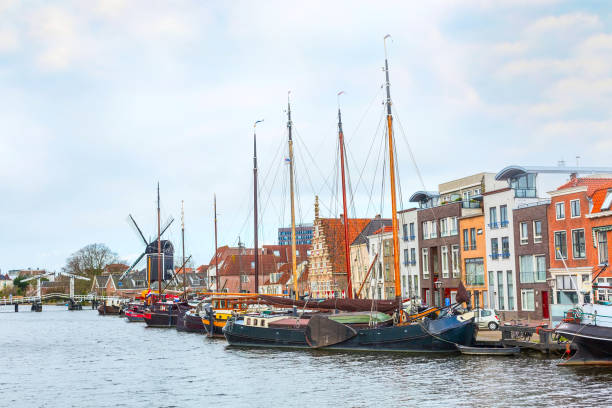 istock Traditional houses, ships, canal perspective in Leiden, Netherlands 643909730