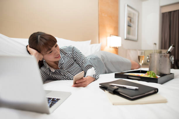 istock A woman is using the smartphone to do the search. 643913370
