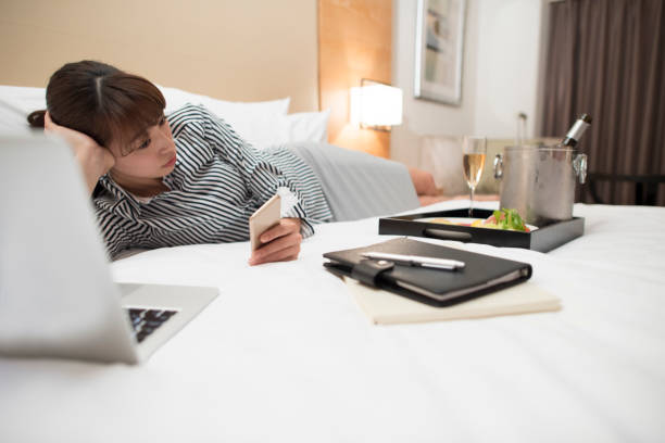 istock A woman is using the smartphone to do the search. 643913376