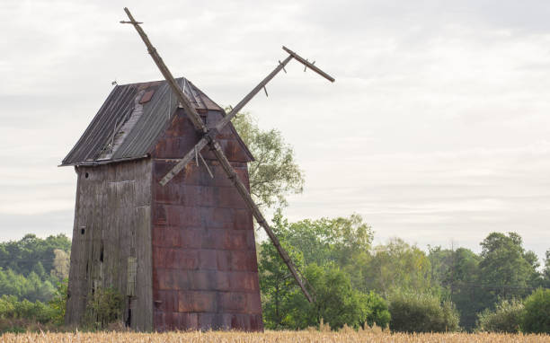 istock Kawnice, Poland. Old ruined windmill on the field. 643919460