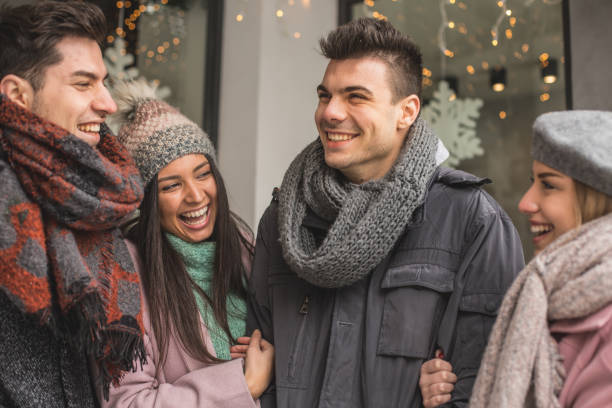 istock Friends laughing in front of cafe 643924680