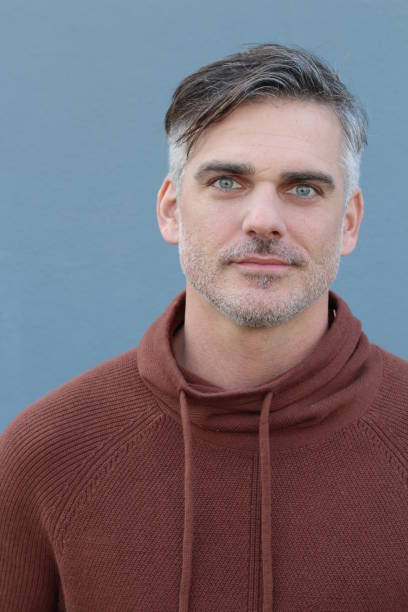 istock Handsome mature man smiling with blue eyes 643927024