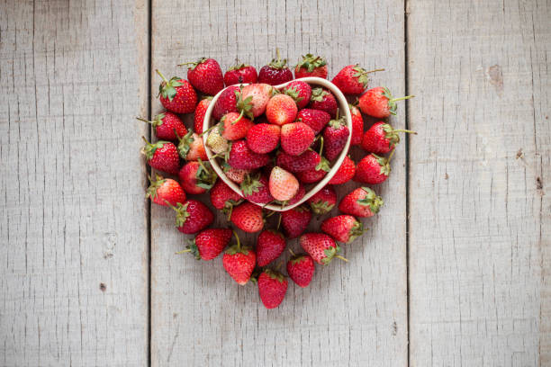 istock Strawberry on the wood. 643928192
