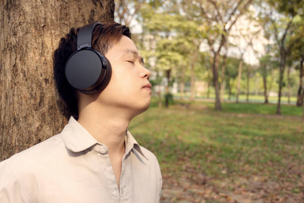 istock Close up of man is relaxing in park. 643942714