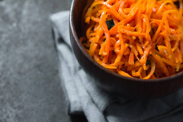 istock Carrots in Korean with spices on a metal table partial blur 643947016