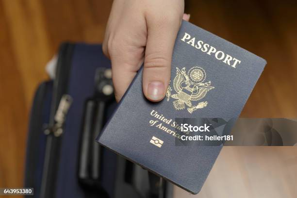 Checking In At Airport Stock Photo - Download Image Now - Passport, USA, Human Hand