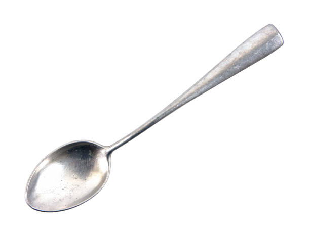 istock Silver tea spoon.Aluminum tea spoon isolated 643980468