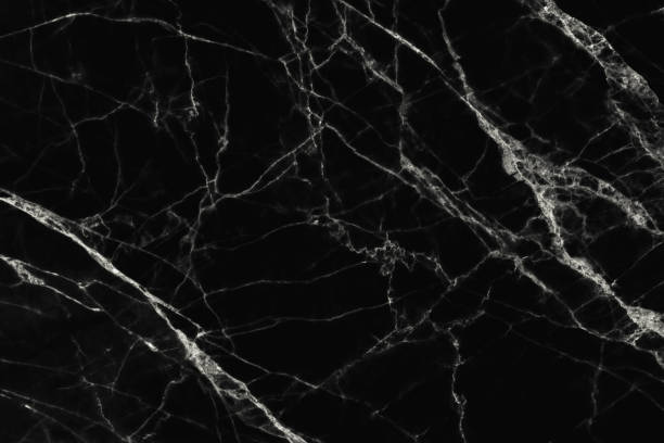 istock The luxury of black marble texture and background. 643981238
