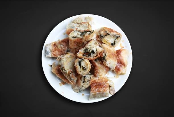 istock Kol boregi (Arm borek) is a Turkish puff pastry prepared in long roll 643981376
