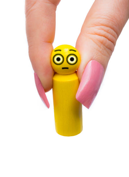 istock Yellow pawn with emoji surprised eyes 643983980