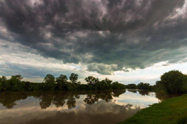 istock Ominous stormy sky over natural lake 643984698