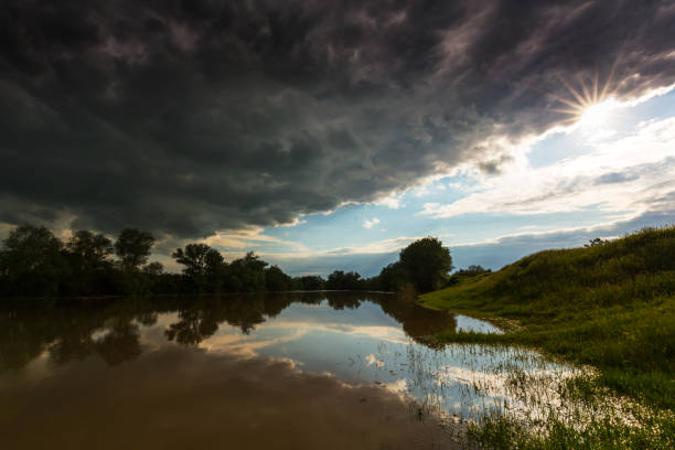 istock Ominous stormy sky over natural lake 643984950