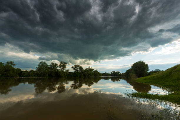 istock Ominous stormy sky over natural lake 643985130