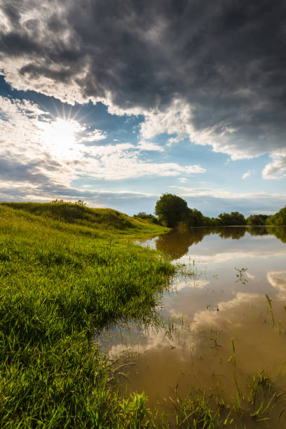 istock Ominous stormy sky over natural lake 643985260