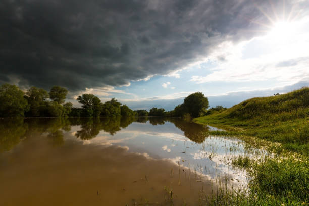 istock Ominous stormy sky over natural lake 643987360