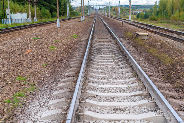 istock Railroad tracks stretching into the distance 643991744