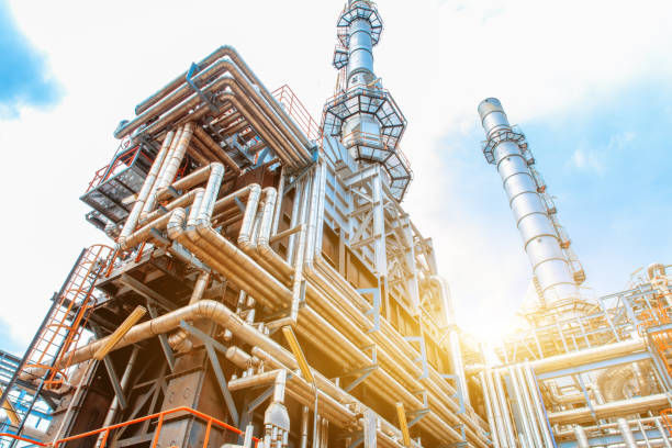 Petrochemical Refinery oil and gas industry Petrochemical oil refinery, Refinery oil and gas industry, The equipment of oil refining, Close-up of Pipelines and petrochemical industrial plant towers view of oil and gas refinery refinery photos stock pictures, royalty-free photos & images