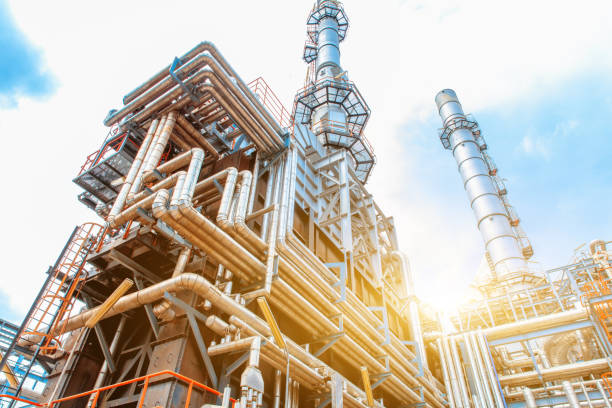 Petrochemical Refinery oil and gas industry Petrochemical oil refinery, Refinery oil and gas industry, The equipment of oil refining, Close-up of Pipelines and petrochemical industrial plant towers view of oil and gas refinery petrochemical plant stock pictures, royalty-free photos & images