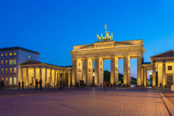 istock Brandenburg gate illuminated in Berlin, Germany 643995146