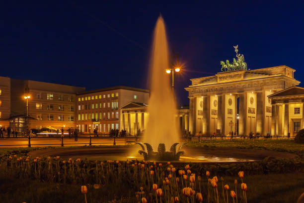 istock Brandenburg gate illuminated in Berlin, Germany 643995188
