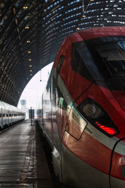 istock Red Train in Milan Central Railway Station, Italy 644006598