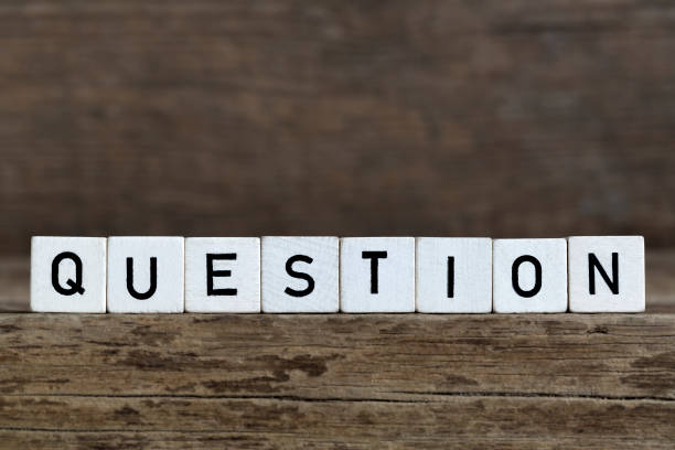 istock Question, written in cubes on wooden background 644007594