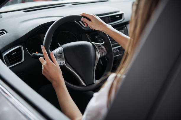 istock Female driving car. 644037588