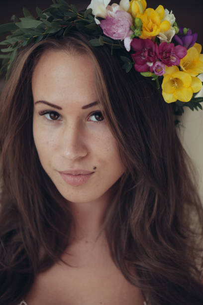 istock Young bride with floral wreath 644041100