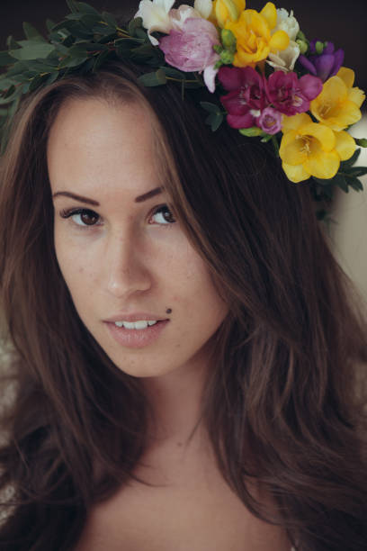 istock Young bride with floral wreath 644041120