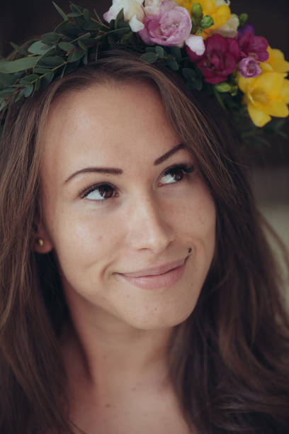 istock Young bride with floral wreath 644041128