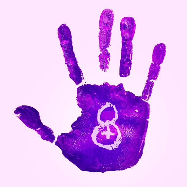 One handprint made with ink on a worn wall.