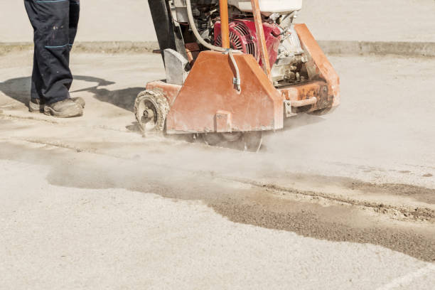 istock Asphalt or concrete cutting with saw blade 644057266