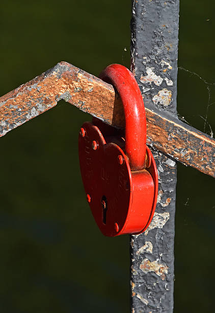 istock Close-Up Of Heart Shaped Padlock On Rusty Metal 644057777
