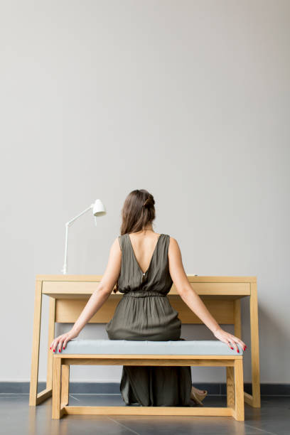 istock Pretty young woman in the room 644067026