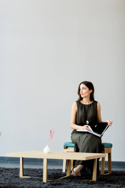 istock Pretty young woman in the room 644070268